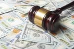 Judges Or Auctioneer Gavel On The Dollar Cash Background, Top View, Close-Up. Concept For Corruption, Bankruptcy, Bail, Crime, Bribing, Fraud, Auction Bidding, Fines